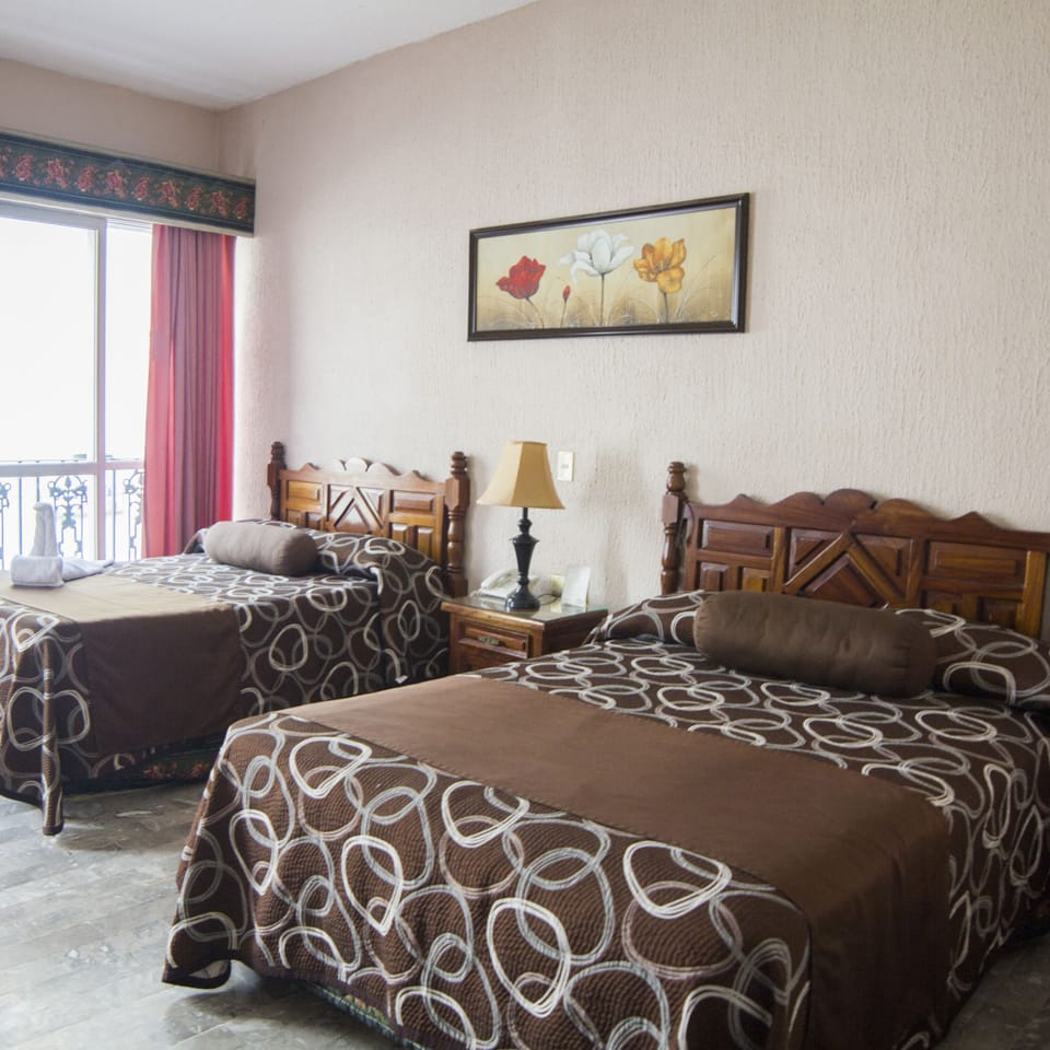 Family Room | Premium bedding, in-room safe, iron/ironing board, free WiFi