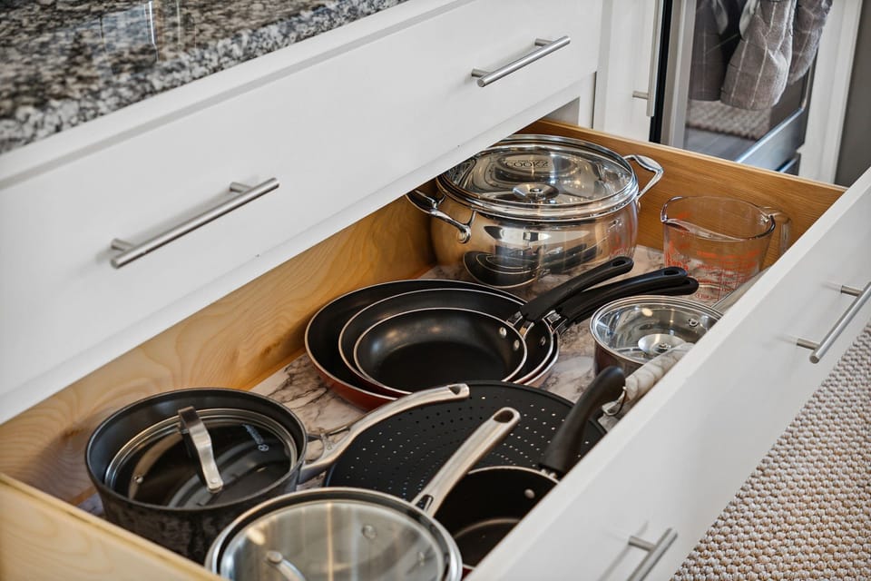 Stocked..large pots and serving pieces. Crock Pot, griddle, Brita water pitcher