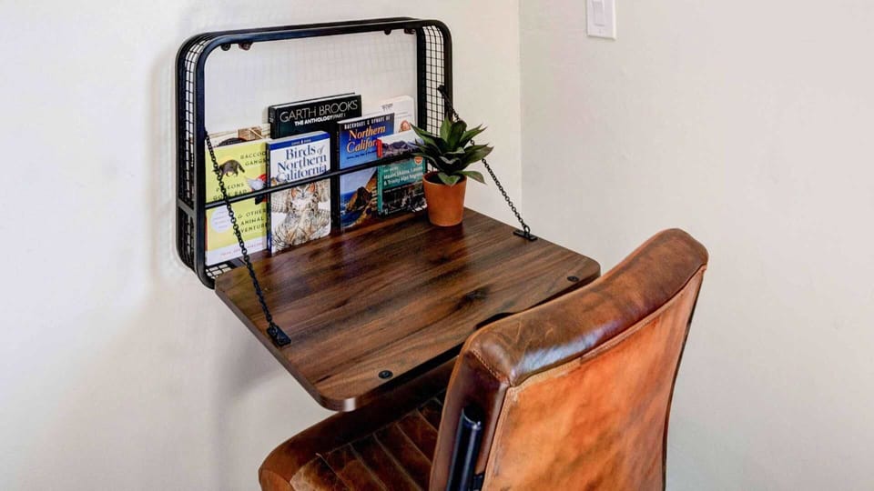 The little desk is small but cozy enough to get the day's work done. 