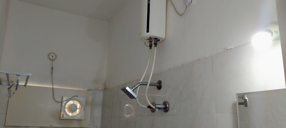 Shower, rainfall showerhead, towels