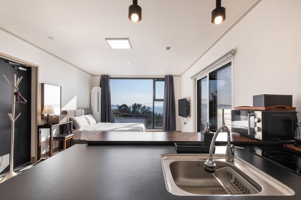 Standard Room - Room 201, Room 202 randomly assigned | Private kitchen | Fridge, microwave, rice cooker, cookware/dishes/utensils