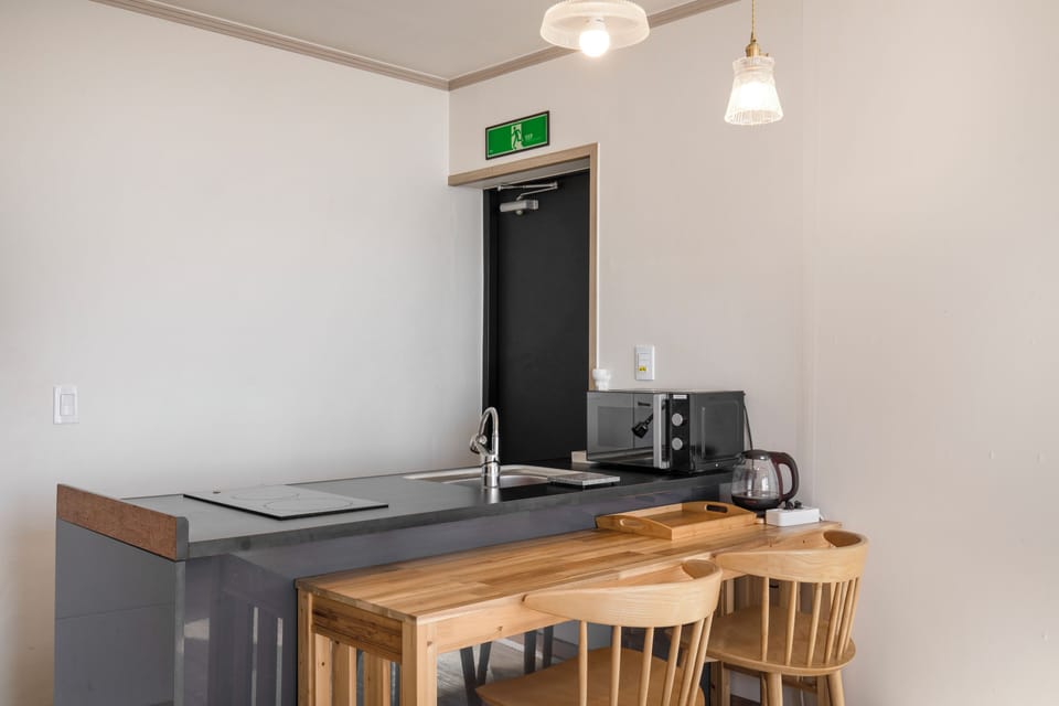 Standard Room - Room 201, Room 202 randomly assigned | Private kitchen | Fridge, microwave, rice cooker, cookware/dishes/utensils