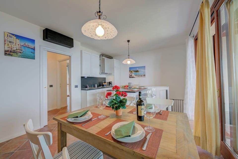 Family Apartment, 2 Bedrooms, 2 Bathrooms, Mountainside (Borgo Belvedere-lake view & shared) | Dining