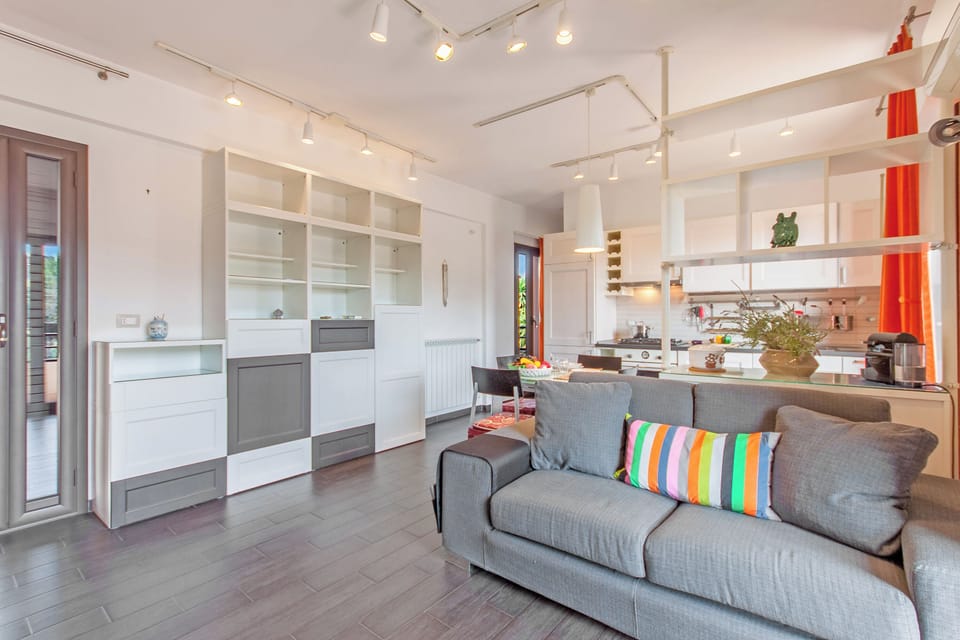 Family Apartment, 1 Bedroom, Microwave (Vicerè Apartment With AC and Wi-Fi) | Living area | Flat-screen TV
