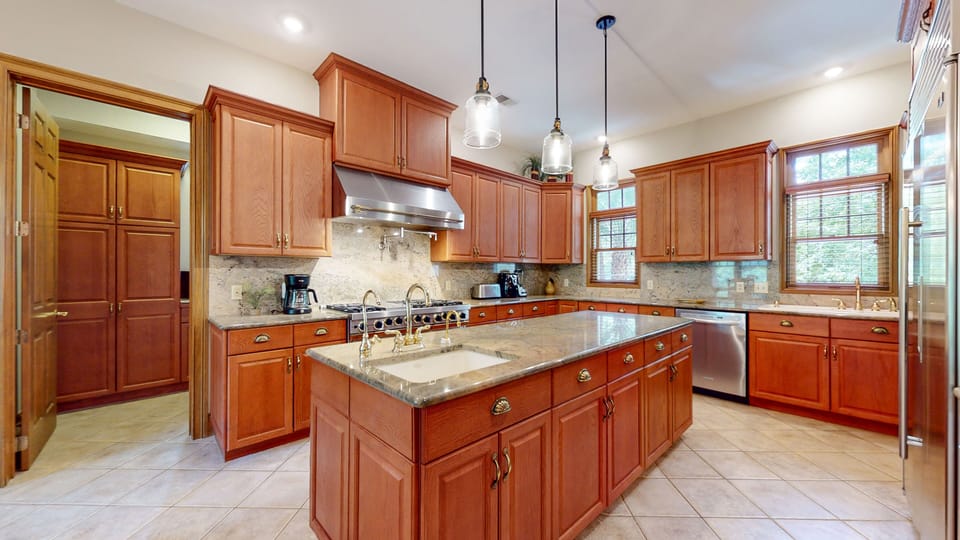 Fully Stocked Kitchen with Custom Cabinetry