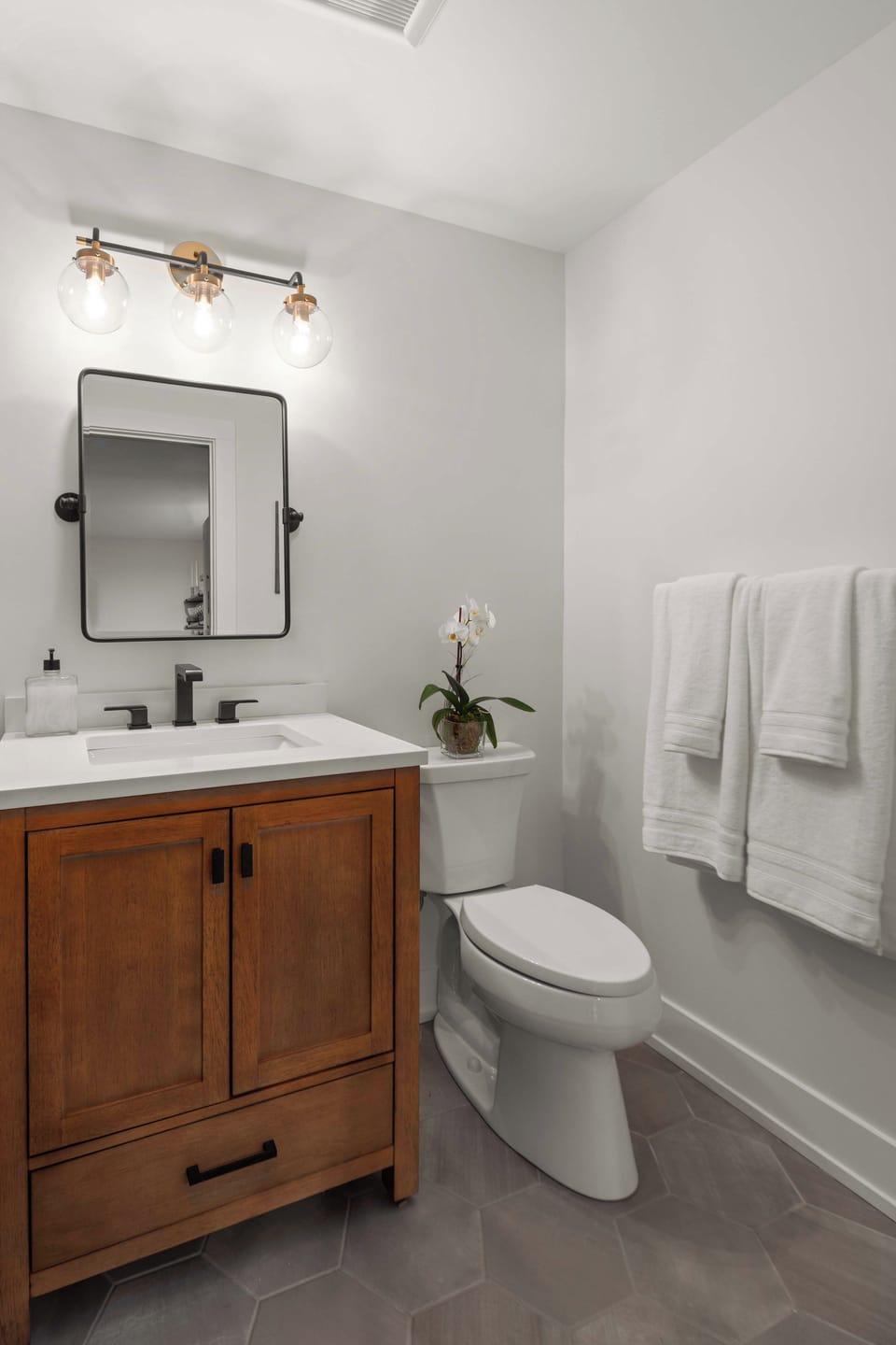 Unit 4 | Bathroom 1 | Full Bathroom | Walk-In Shower + Bathtub | Serves Bedrooms 1 & 2 | Third Floor
