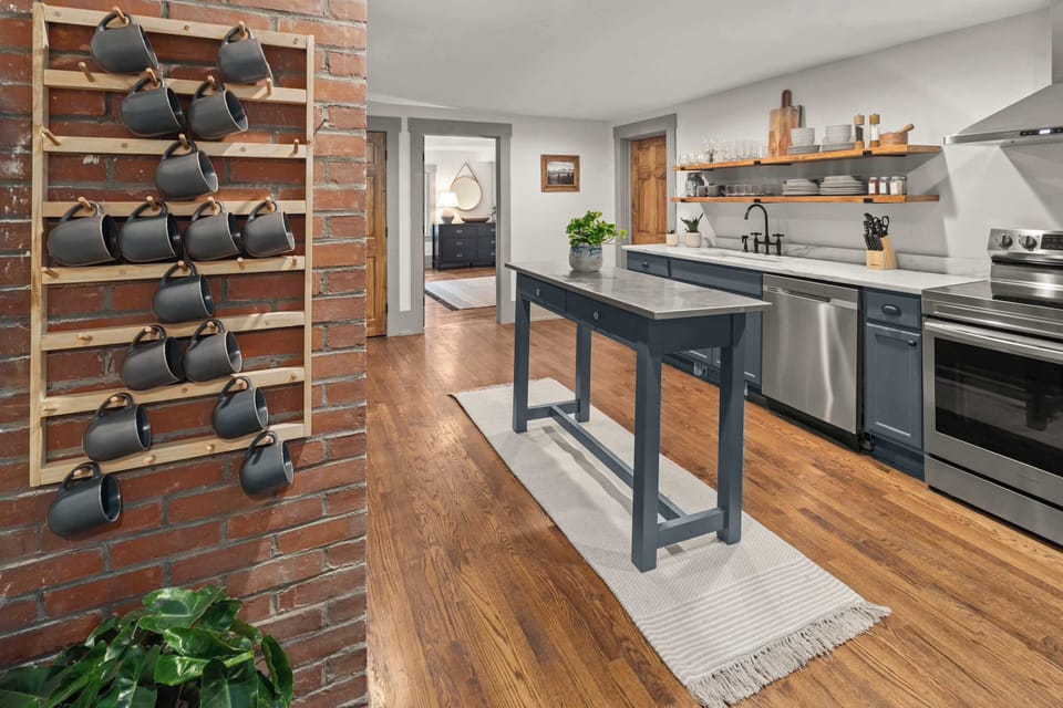 Open Concept Chef's Kitchen | Fully Stocked | Open to Dining | Second Floor
