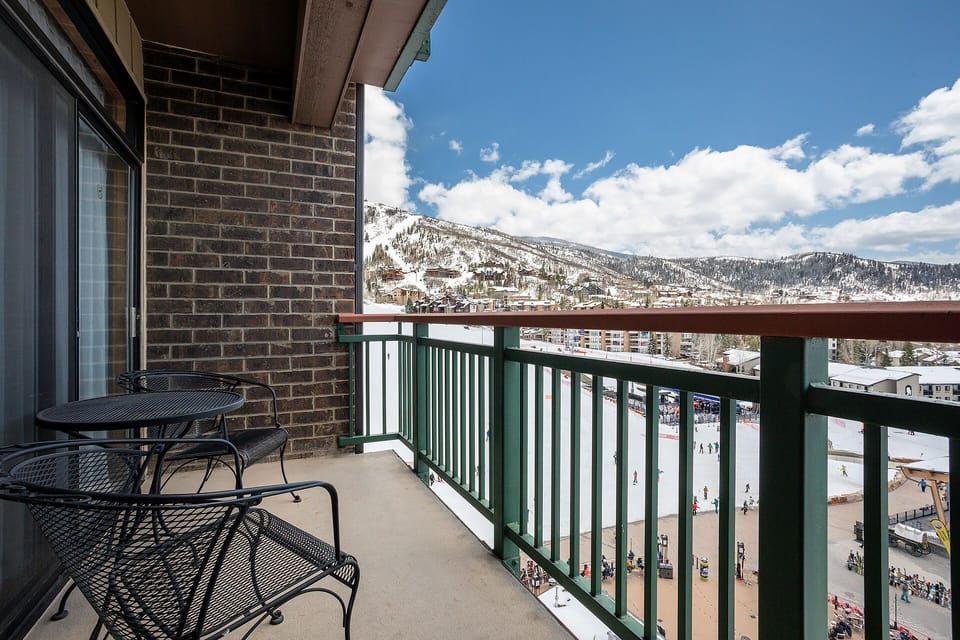 Step onto your private balcony and soak in breathtaking mountain views while sipping morning coffee at your outdoor table.