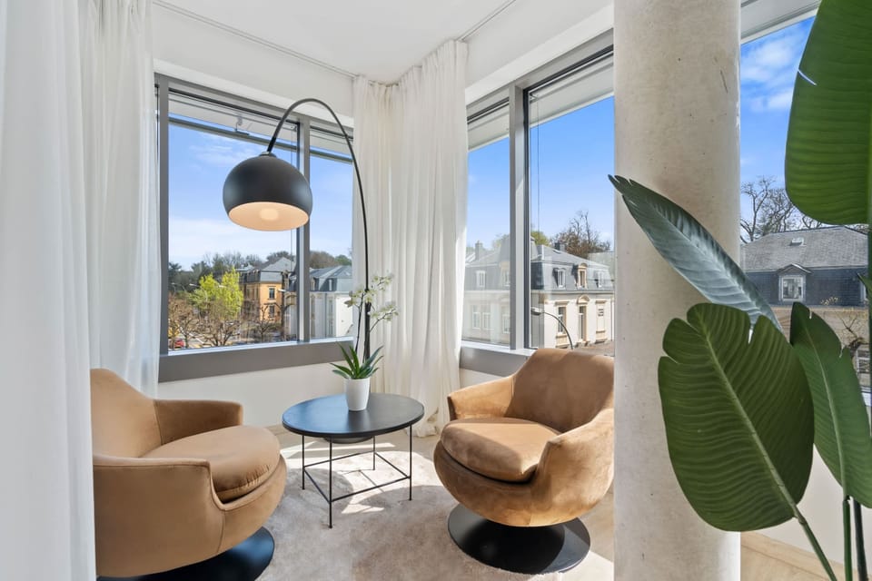 Soak up the sun in our cozy reading nook with city views.