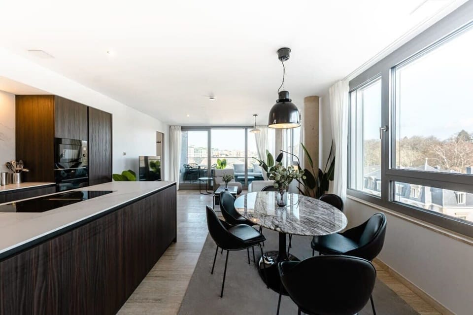 Expansive living space with stylish furnishings and ample light.