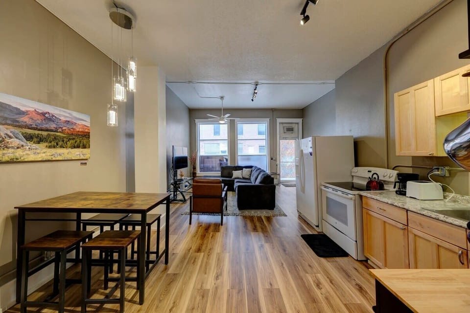 Cook, gather, and connect in this modern studio layout.