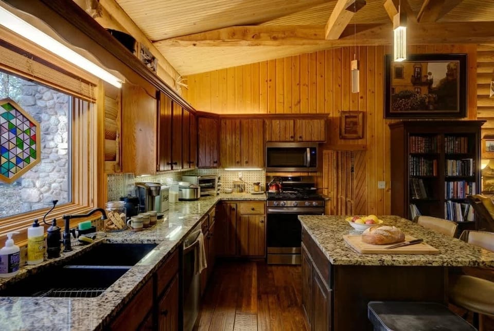 Kitchen island adds space for meals or casual conversations.