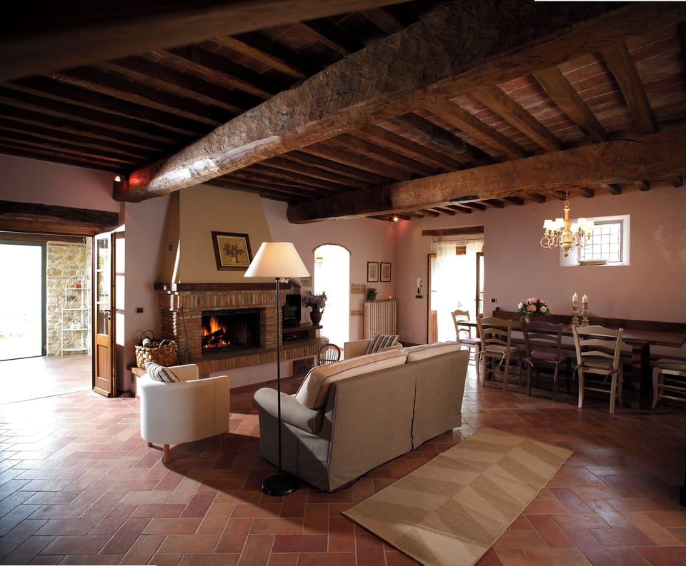 Villa | Living area | Flat-screen TV, fireplace