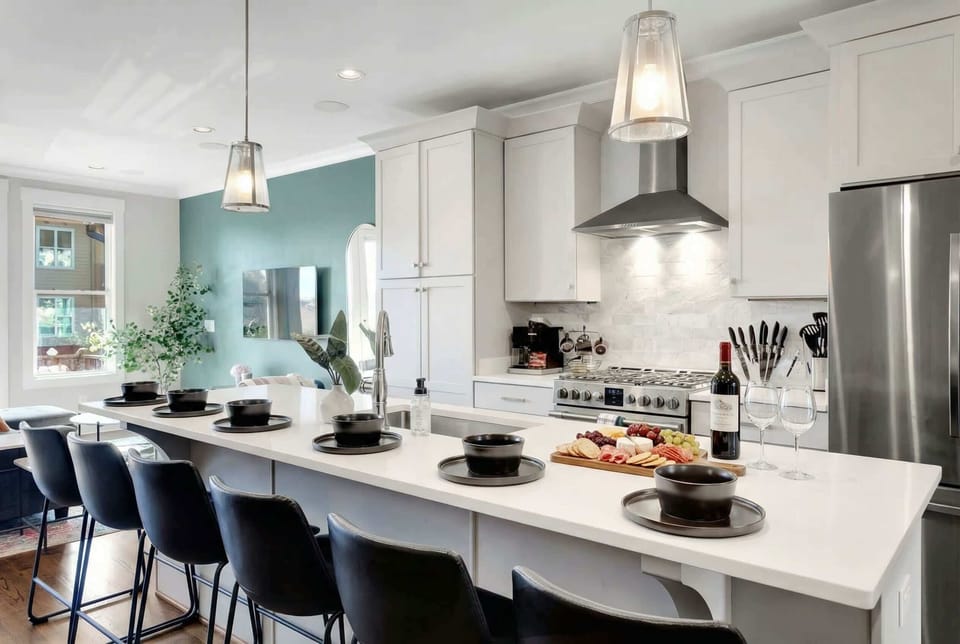 Experience this stylish kitchen in Downtown Nashville, ideal for vacation rentals. Perfect for family gatherings, bachelorette parties, or corporate retreats—it's an upscale oasis for cooking and brunching. Your home base for exploring Music City!