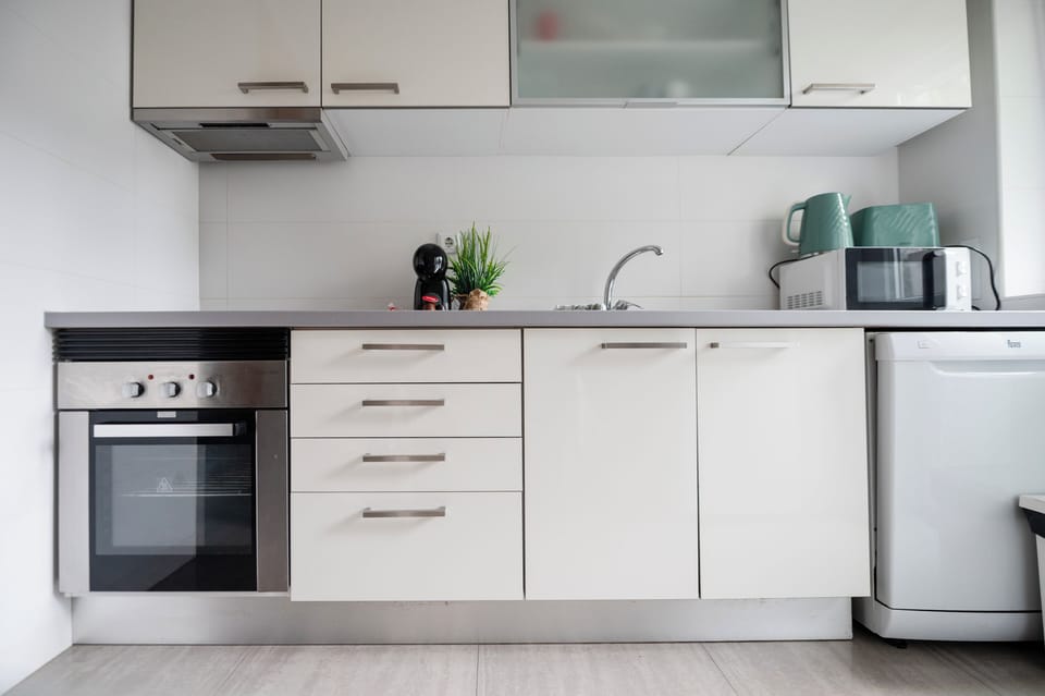 Apartment | Private kitchen | Espresso maker, full-size fridge, microwave, oven