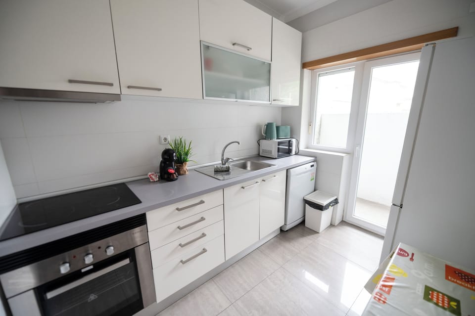 Apartment | Private kitchen | Full-size fridge, microwave, oven, stovetop