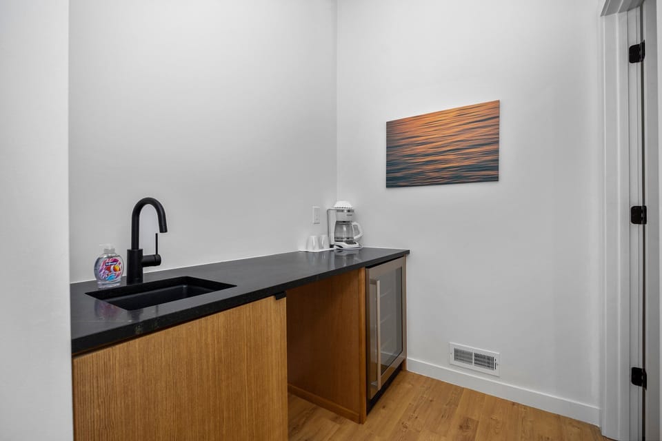 Master suite wet bar with mini refrigerator