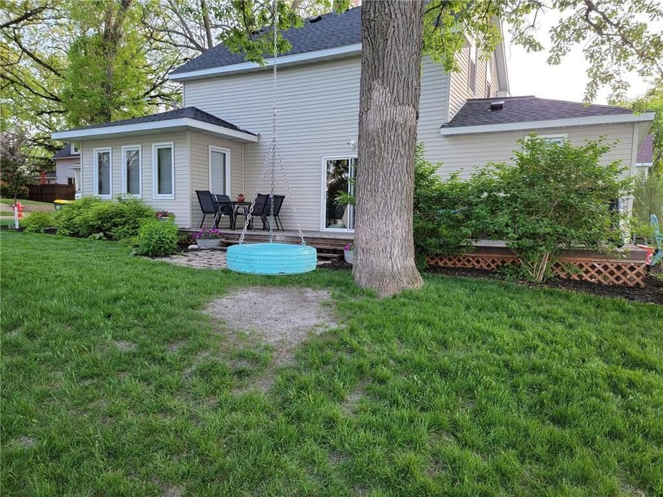 tire swing for the kids, outdoor dining on the patio and large yard for games