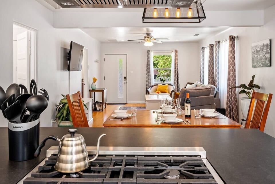 Open floor plan with chef's kitchen and seating for up to six.