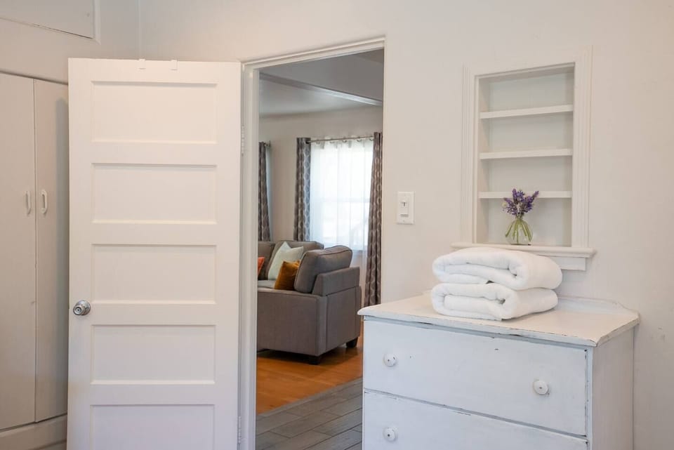 Craftsman doors,  built-in shelving, and original molding add tons of character and charm to this home. 