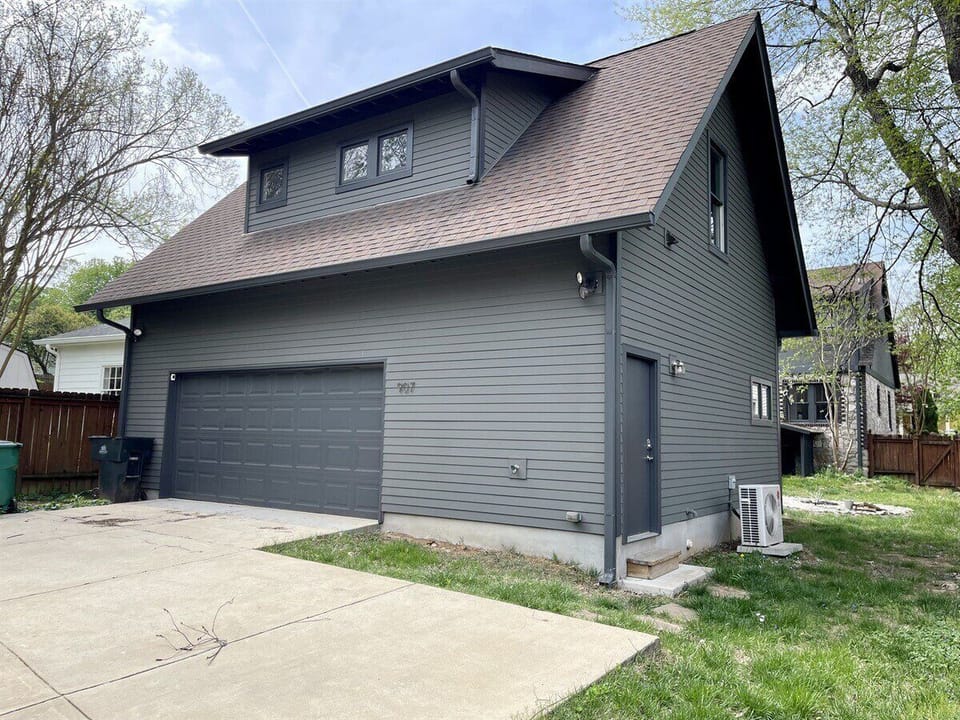 Standalone structure with parking and quiet surroundings.