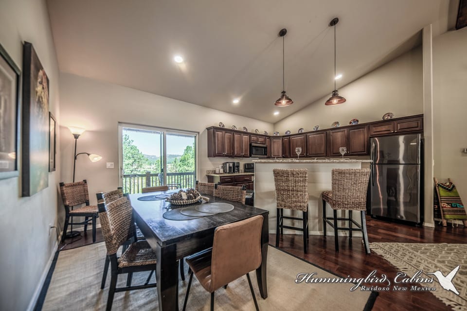 View of the breakfast bar and kitchen from the dining area