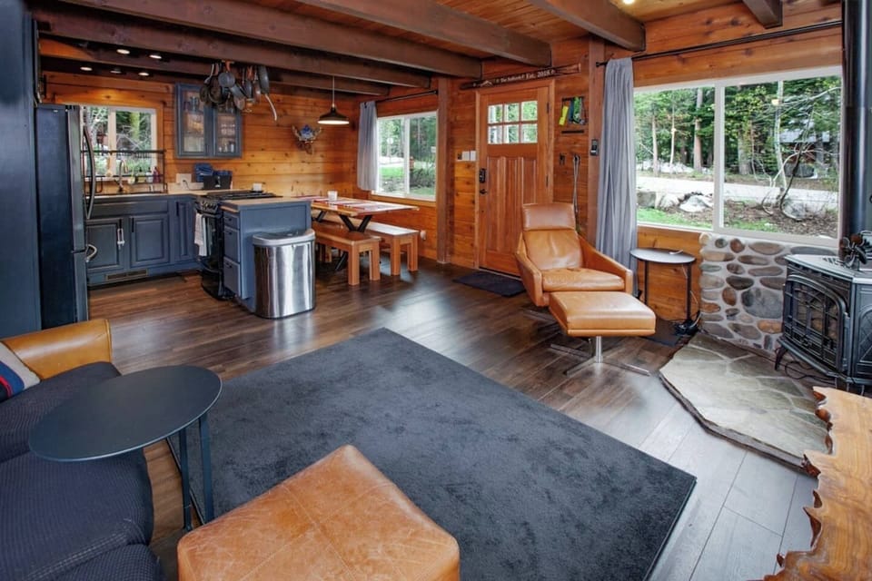 Open concept Living Room and Kitchen/Dining Area with cozy electric fireplace!