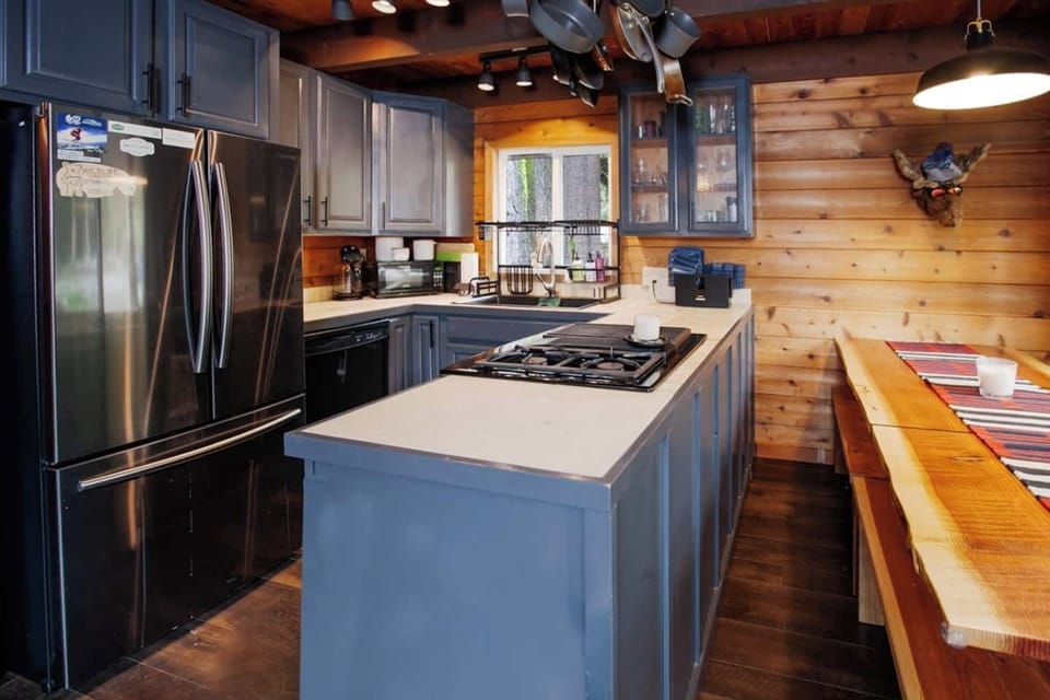 Fully equipped open concept kitchen with modern appliances! 