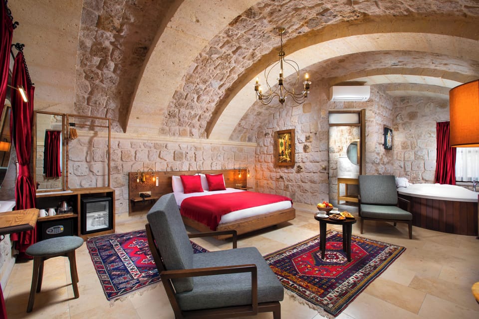 Executive Suite | Premium bedding, minibar, in-room safe, individually decorated
