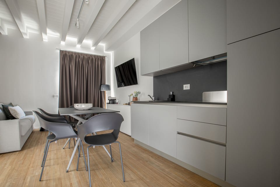 Premium Apartment | Living area | 32-inch flat-screen TV with digital channels, TV