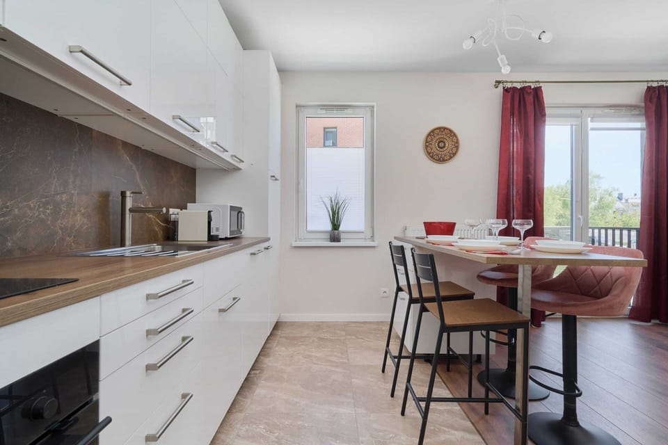 The fully equipped kitchenette includes everything you need for a home-cooked meal.