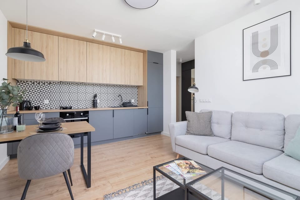 The living room's sleek design is both functional and aesthetically pleasing.
