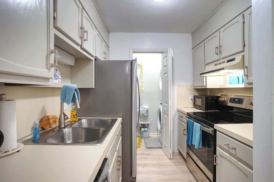 Laundry room at end of kitchen