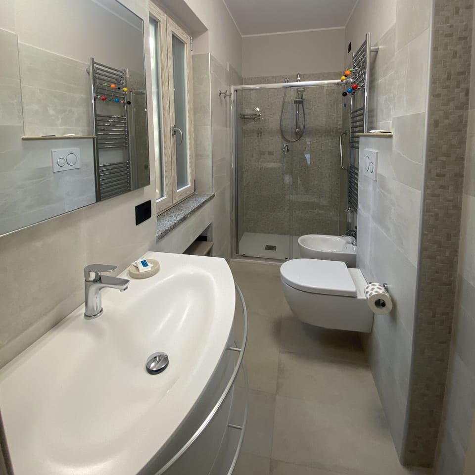 Deluxe Room, 1 Double Bed with Sofa bed, Terrace | Bathroom | Shower, rainfall showerhead, free toiletries, hair dryer
