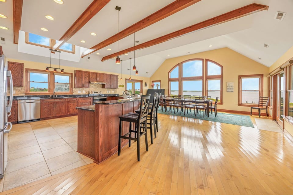 A flowing floor plan seamlessly blends the second level spaces for effortless living and entertaining.