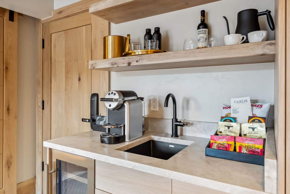 Kitchenette: Nespresso coffee & espresso maker, Rishi Tea, quick kettle, mini-fridge, honor bar snacks and drinks
