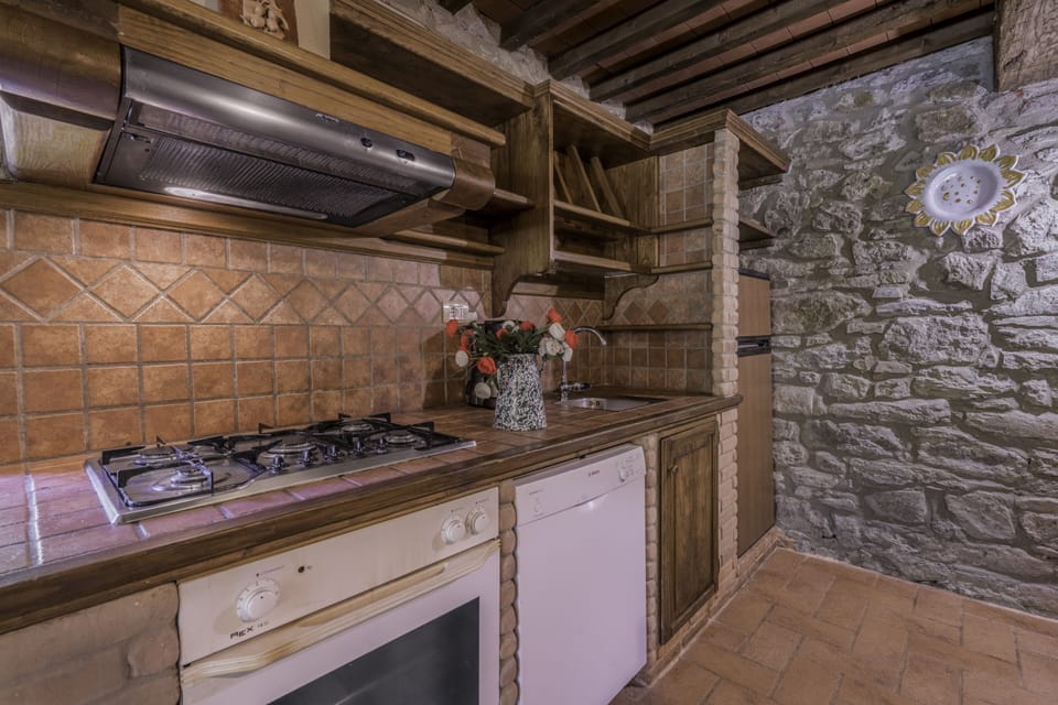 Villa | Private kitchen | Full-size fridge, stovetop, dishwasher, coffee/tea maker