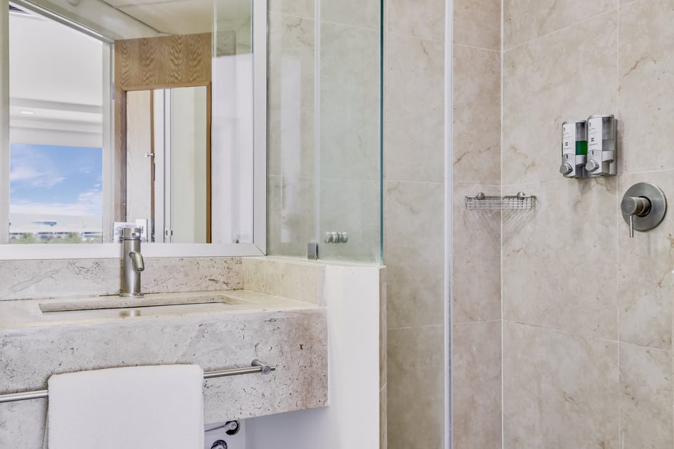 Shower, free toiletries, hair dryer, towels