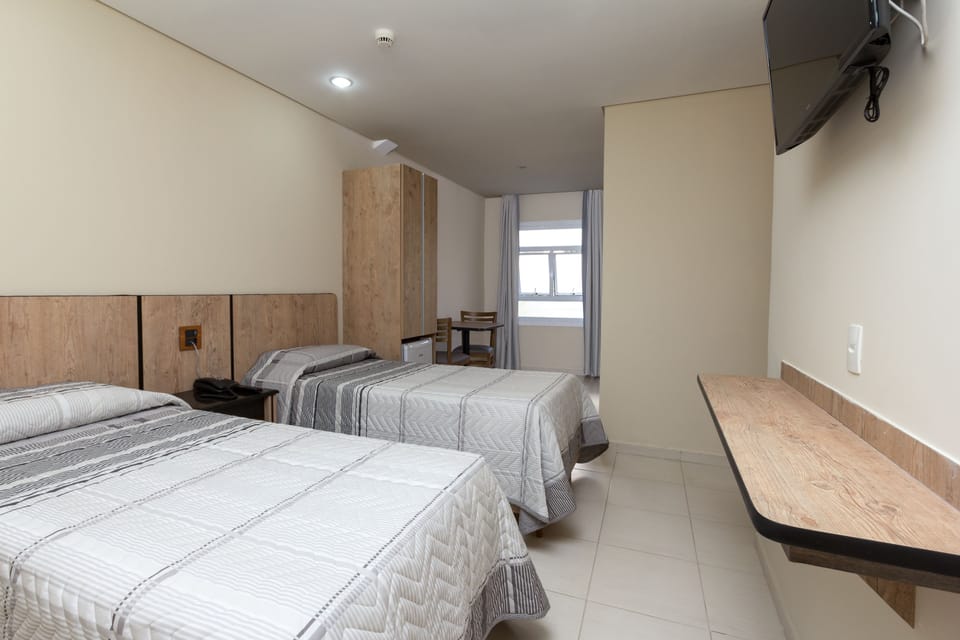 Twin Room | Minibar, free cribs/infant beds, free WiFi, bed sheets