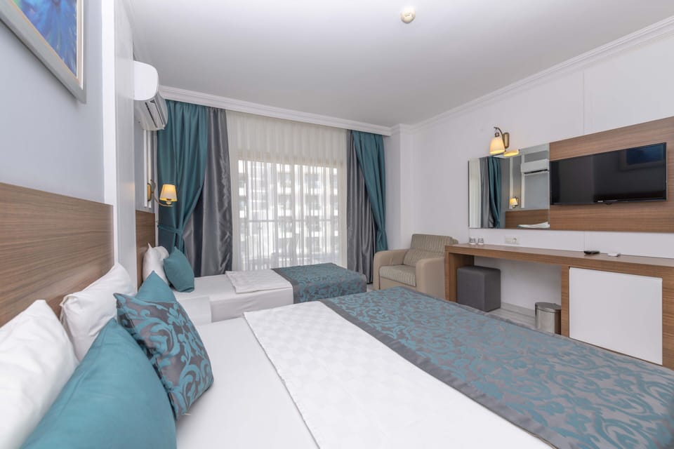 Free minibar items, in-room safe, desk, laptop workspace