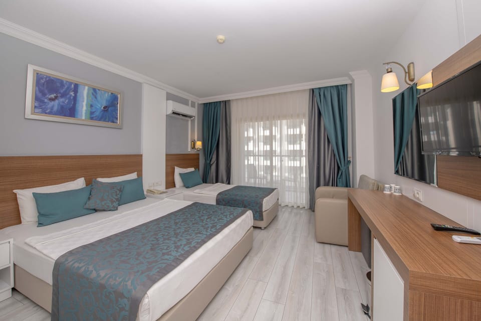 Free minibar items, in-room safe, desk, laptop workspace