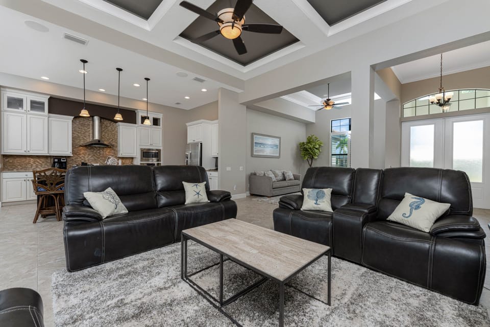 Open floor plan with 2 large living rooms, kitchen and dining room.