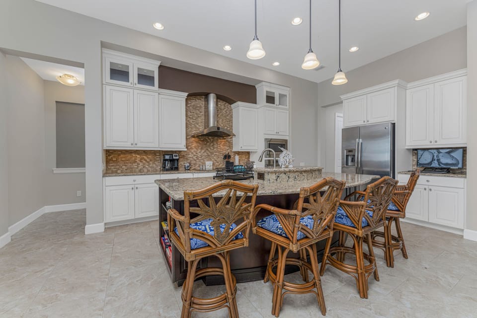 Large kitchen with center island seating and everything you need. 