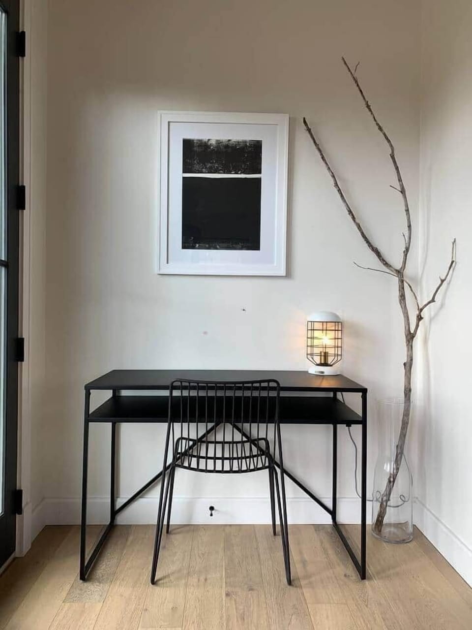 your live + work balance, simple desk/light + writing utensils 