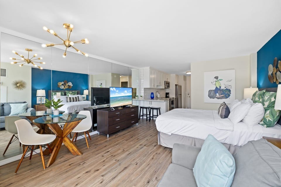 Open-concept living room and kitchen, perfect for enjoying meals or relaxing on the sofa while taking in the cozy atmosphere.