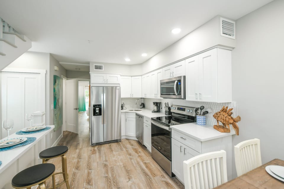 The kitchen is fully stocked with the essentials, making it easy to dine in whenever the mood strikes.