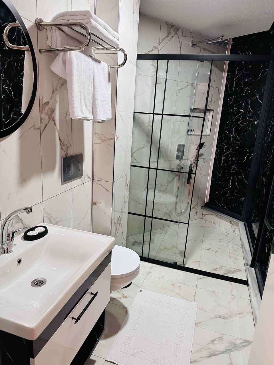 Hair dryer, bathrobes, slippers, towels