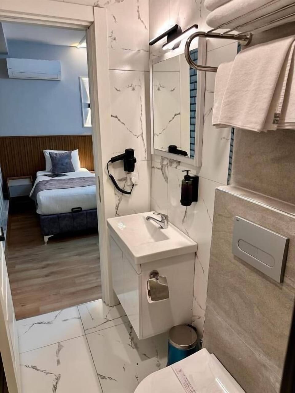 Hair dryer, bathrobes, slippers, towels