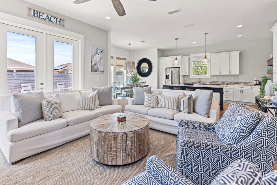Sink into coastal comfort in your bright, airy living space where beach vibes meet modern style and natural light fills every corner.