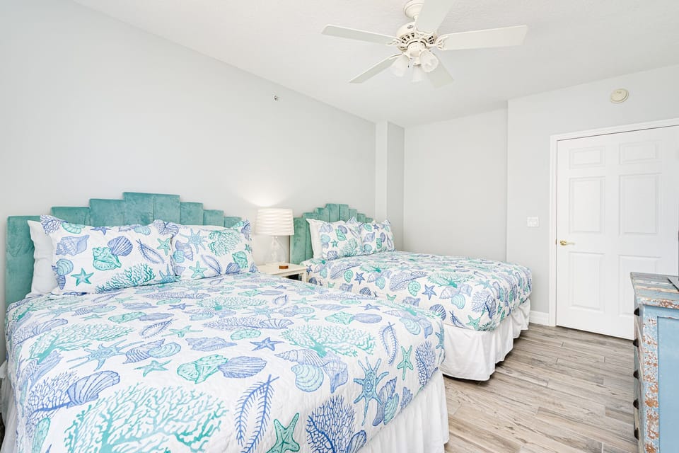 Two queen beds and a Smart TV